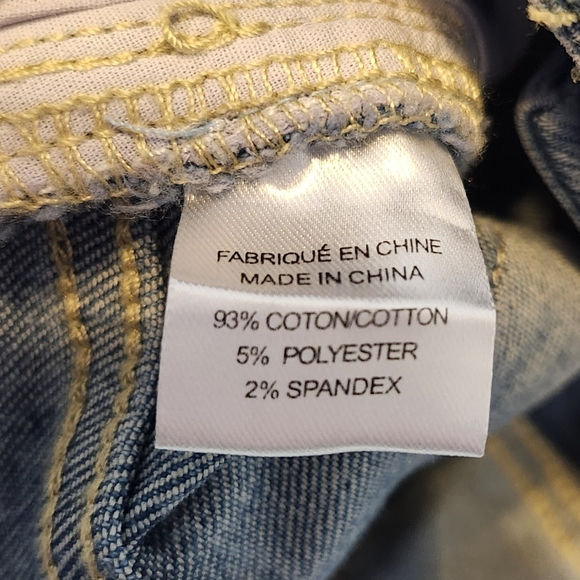 Upclycled Distressed Blue Jeans With Gold Accents And Floral Appliques - Picture 5 of 5